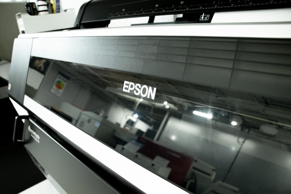A closeup of an Epson printer.