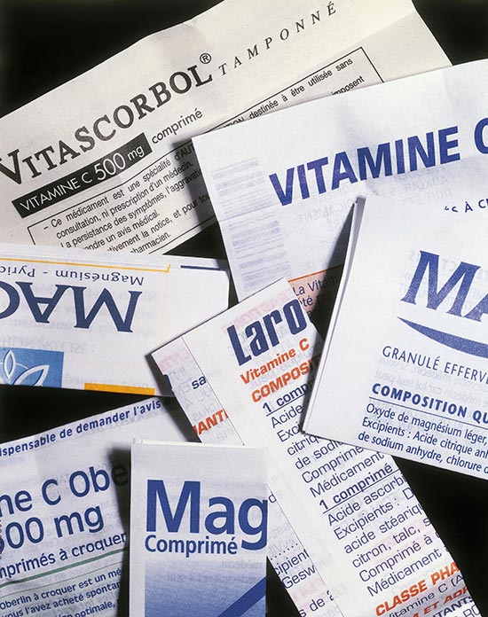 Stack of several folded pharmaceutical Instruction-for-Use print-outs